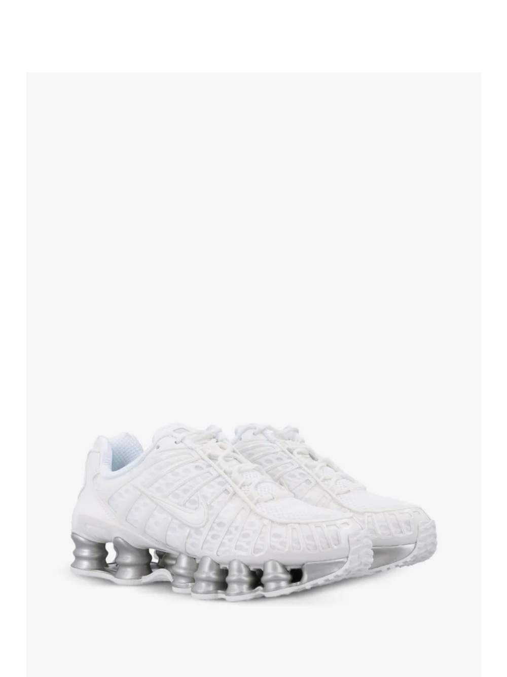 Nike Women’s White Sneakers with Silver Shox Nike
Shox TL sneakers